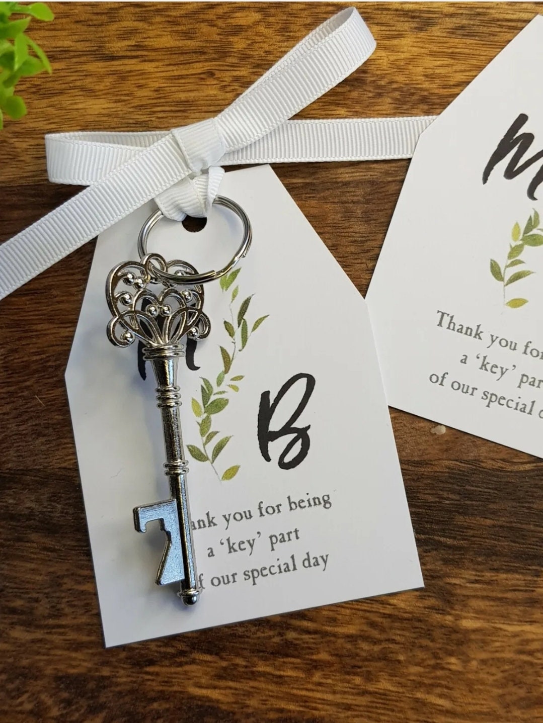 Botanical Wedding Favors: Key Bottle Opener with Personalised Tag and ribbon