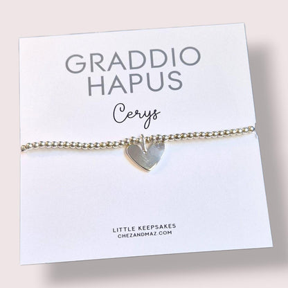 Personalized Graduation Bracelet: Silver Heart Charm, "Graddio Hapus" Welsh Card